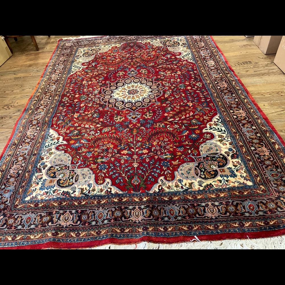 Hand made ,knotted , woven rug from India.